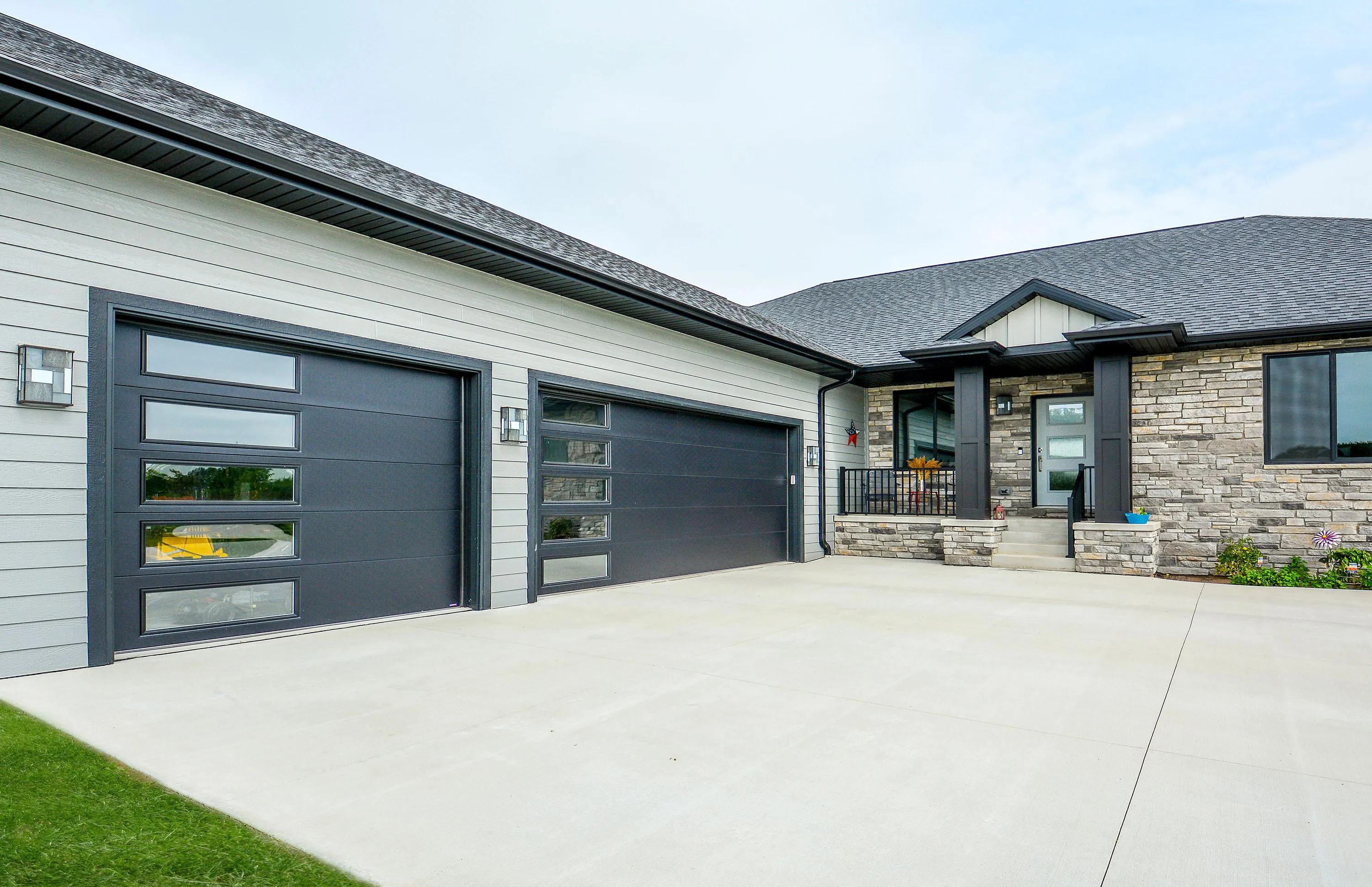 residential garage door flush design black color